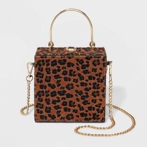 Leopard print clutch with removable strap